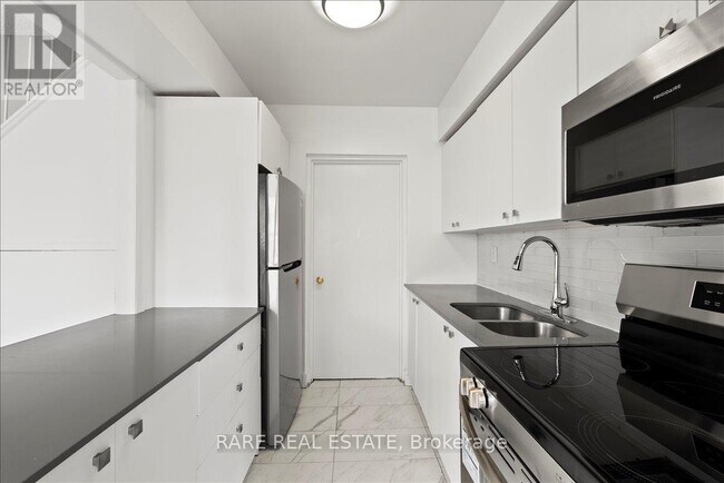 Photo du bâtiment - 7555 Goreway Dr