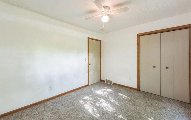 Building Photo - Huge yard on a corner lot.  Just out of town but close to everything