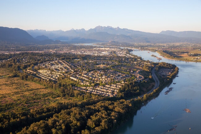 An aerial view of Port Coquitlam shows residential neighborhoods close to the lake.