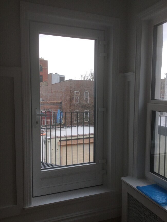 Living room and fire escape. - 1222 Carroll Street