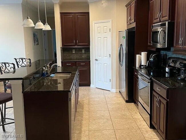 Building Photo - 8570 Evernia Ct