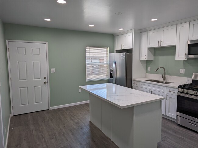 Kitchen & front entry - 3847 W 104th St