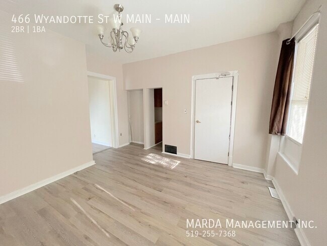 Building Photo - COZY 2 BEDROOM 1 BATH MAIN FLOOR UNIT+ 50% GAS