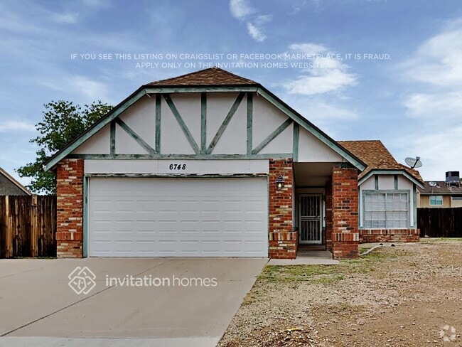 Building Photo - 6748 W Cinnabar Ave