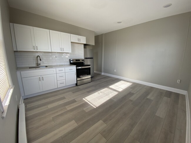 Building Photo - 4614 Rising Sun Avenue, Unit 4