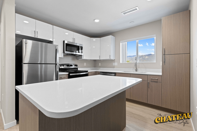 Kitchen Island - Chateau Too Apartments