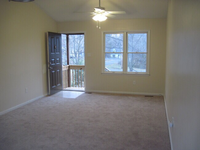 Living room with view out to street. - 2506 Wade Hampton Rd.