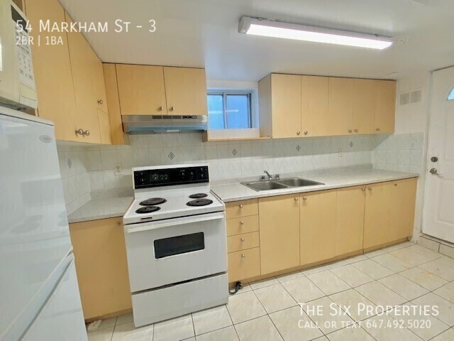 Building Photo - Bright 2 Bedroom Apartment