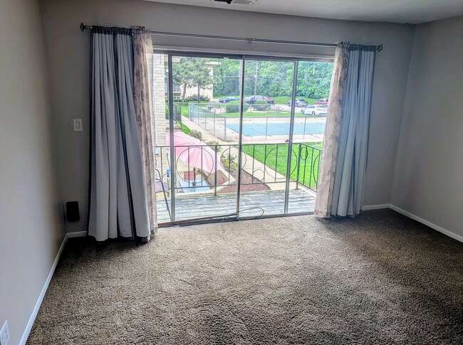 Foto del edificio - Spacious 1BR Condo – Pool Access & Utilities