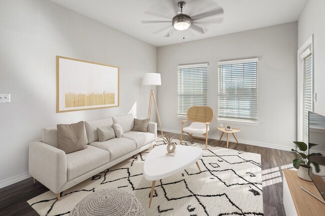 Living rooms include natural lighting and ceiling fans - Azul Apartment Homes