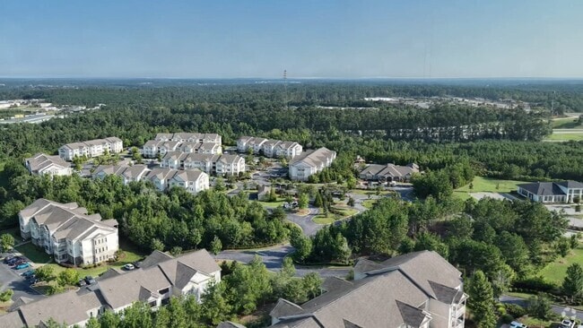  - RIVERSTONE APARTMENTS