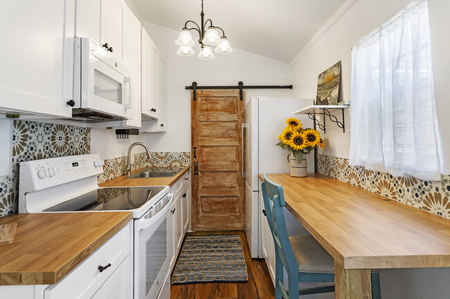 Full sized appliances in this newly renovated kitchen - 8234 Cohn St