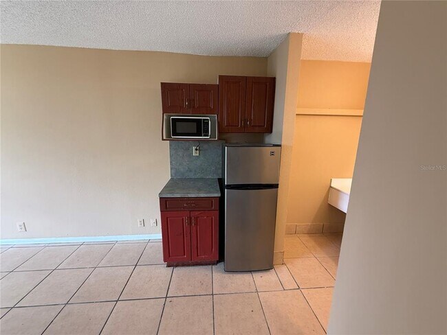Foto del edificio - 7900 S Orange Blossom Trail