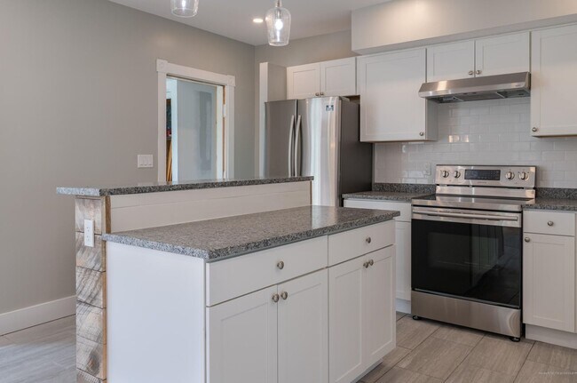 Foto del edificio - Beatiful 4 Bed Downtown Bath House