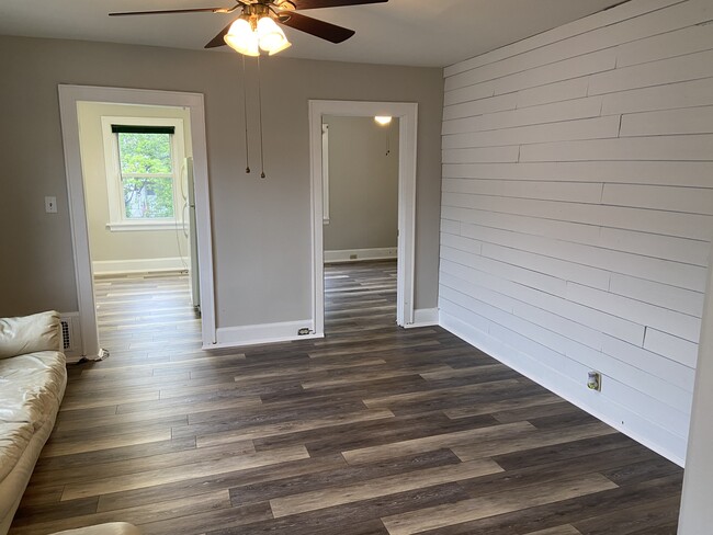 Living room - left door is kitchen, right is bedroom 2 - 5122 Hunter Ave