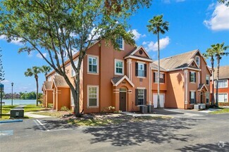 Building Photo - 9208 Lake Chase Island Way