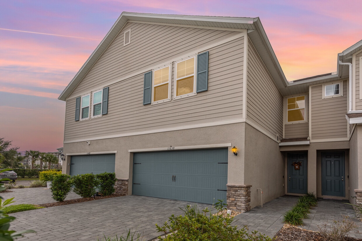 Front view with 2 car garage - 11638 Woodleaf Dr
