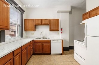 Building Photo - 180-182-182 W 8th Ave