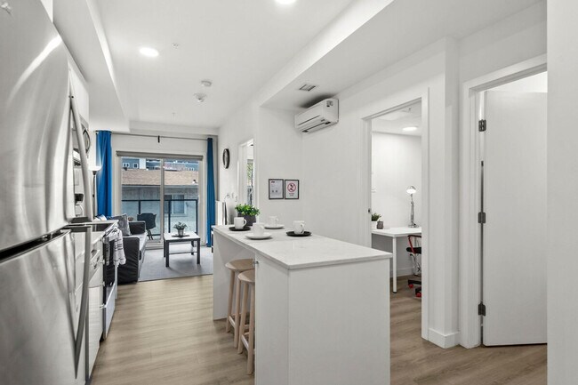 Photo du bâtiment - 455-451 1 Ave NE