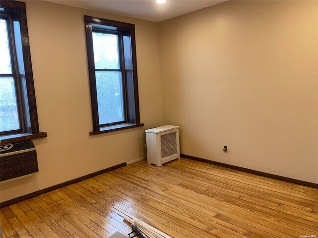 Building Photo - 62-24 60th Dr