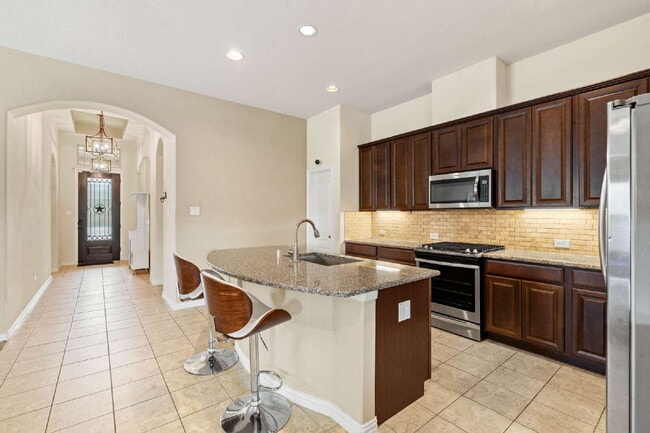 Building Photo - Beautiful 4-Bedroom Home with Solar Panels – Electric Included!