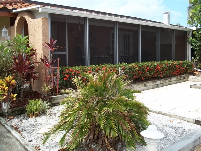 garden and patio next to canal - 1475 Curlew Ave