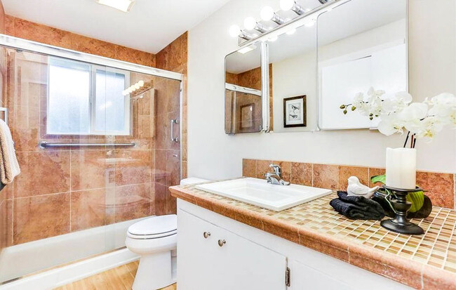 Updated Bathroom with stunning tiling! - 323 NE 193rd St