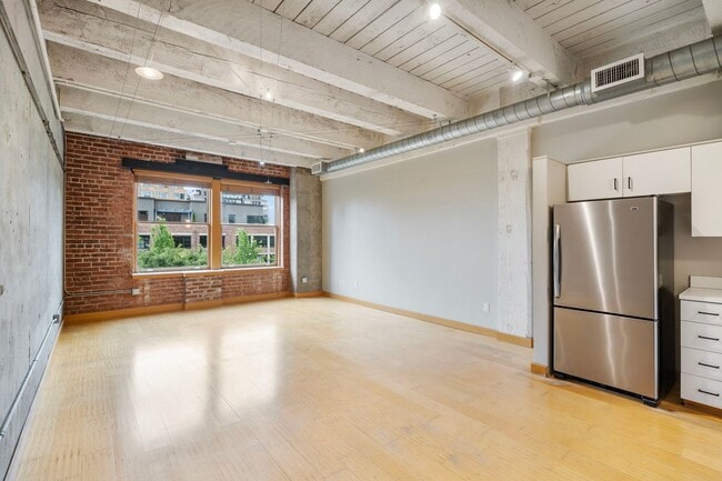 Building Photo - Historic Chown Pella Lofts - east facing studio w/parking/most utilities/rooftop deck