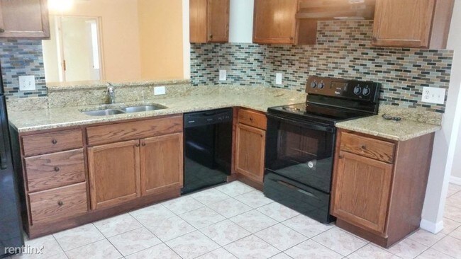 Building Photo - 6208 Kaieteur Ln