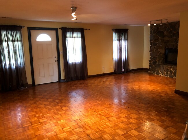 Living room with hardwood floors - 116 Houston Ave