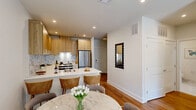 Located at 434 Springfield Ave in Berkeley Heights, NJ, this well-appointed one-bedroom, one-bathroom residence offers a smart and efficient layout across a single floor. The open-concept kitchen and living area serves as the heart of the home, where warm wood cabinetry, a marble-style tile backsplash, stainless steel appliances, and a white quartz peninsula island create a polished yet inviting atmosphere. The living area flows naturally from the kitchen, featuring recessed lighting and warm hardwood flooring that extends throughout the space. A dedicated office provides a quiet, functional workspace complete with its own door for privacy. The bedroom is a serene retreat, bathed in natural light from a large window with neighborhood views, and features clean white walls that lend a calm, restful ambiance. The bathroom is elegantly finished with marble-look tile covering both the floors and walls, a soaking tub and shower combination, and a clean, spa-like aesthetic. Crisp white walls, recessed lighting, and consistent hardwood flooring tie the entire residence together, creating a cohesive, modern feel. This residence combines thoughtful design with practical functionality in a desirable New Jersey location.