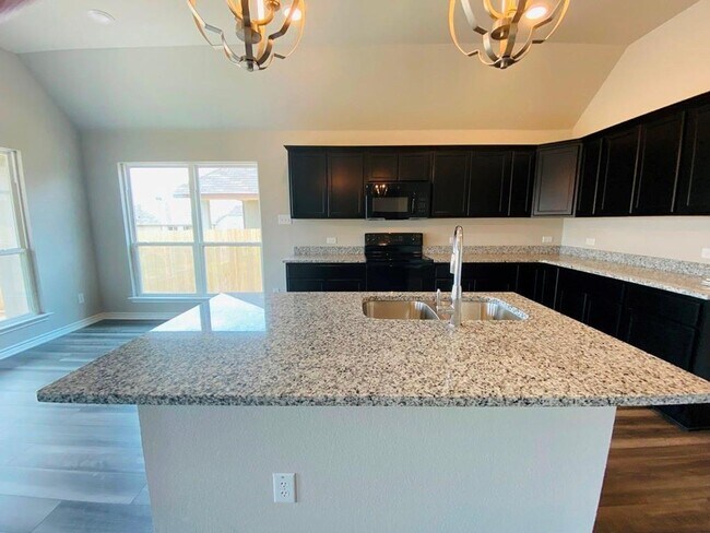 Building Photo - Fabulous, newer one story home nestled in ...