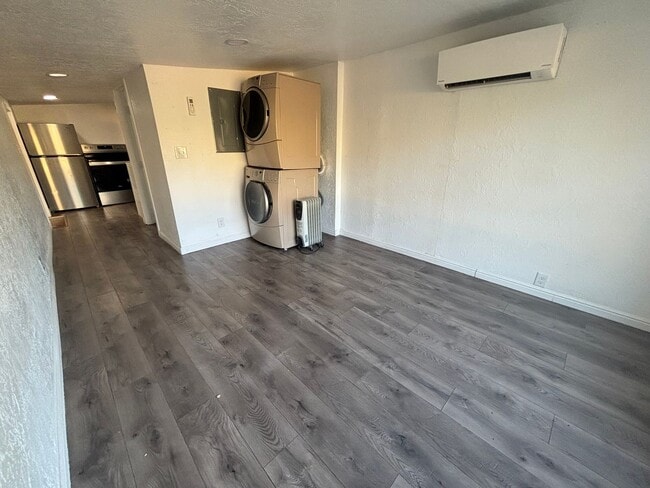 Building Photo - Brand New Updated studio home is a must se...