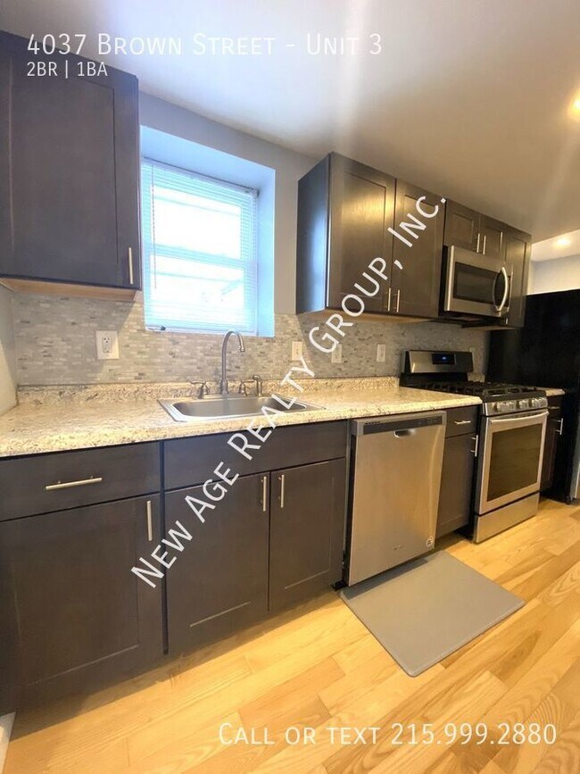 Building Photo - Welcome to 4037 Brown Street!