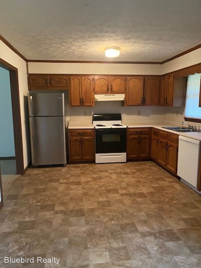 Building Photo - 4 br, 2.5 bath House - 7776 Morant Dr. - 7776