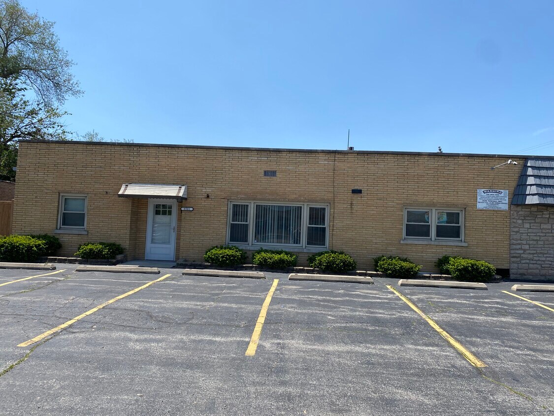 Front view with parking spaces - 8501 W 79th St