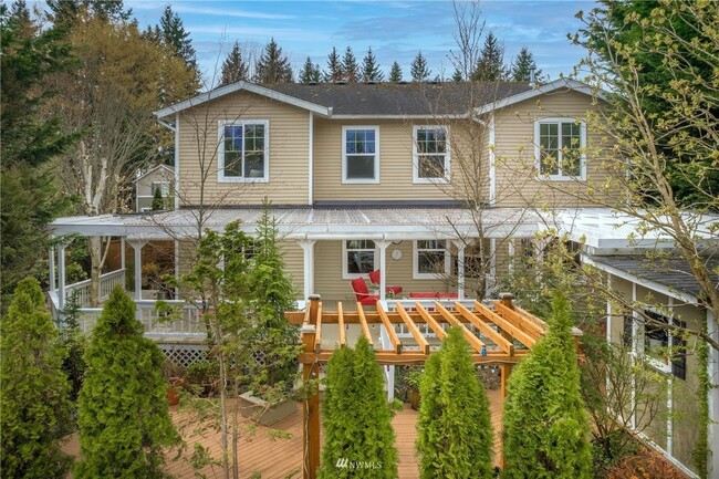 Building Photo - Spacious 5-Bedroom Home with Backyard Oasi...