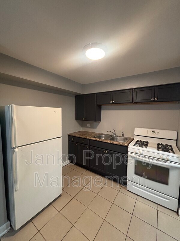 Building Photo - 6435 S Evans Ave