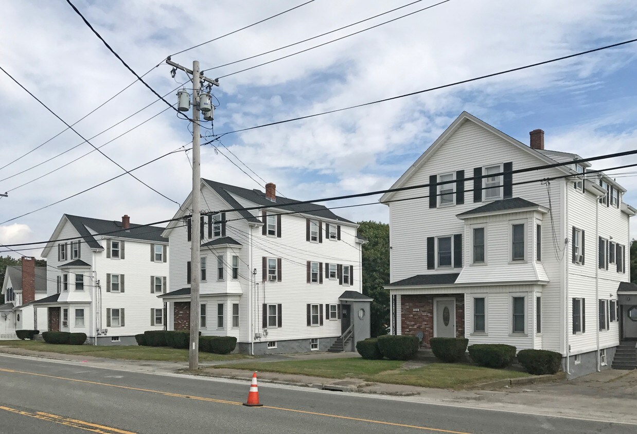 Three, 3-family homes - 3299 E Main Rd
