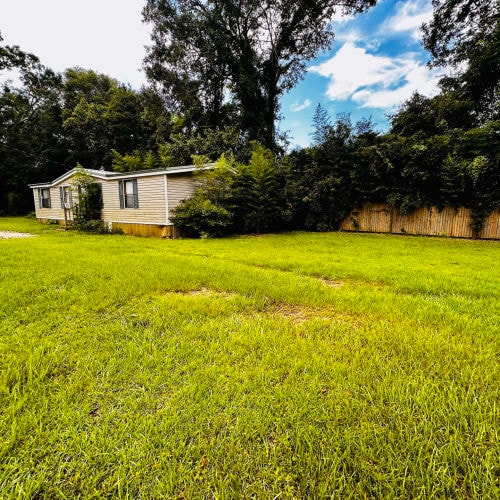 Building Photo - Whispering Pines