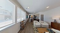 This contemporary townhome in Denver offers a well-designed living space across two floors, totaling 1040 square feet. The property features 2 bedrooms, including a spacious primary bedroom of 150 square feet, and 3 bathrooms for added convenience. The open-concept main floor combines the living room, dining area, and kitchen, creating a seamless flow for entertaining and daily living. Large windows throughout flood the space with natural light, while offering views of the surrounding area. The kitchen boasts modern appliances, sleek cabinetry, and a center island with seating. Bathrooms are elegantly appointed with stylish fixtures and finishes. Hardwood flooring runs throughout the main living areas, adding warmth and durability. The bedrooms feature plush carpeting for comfort. Additional amenities include recessed lighting, a washer and dryer, and ample storage space. The property's location at 17524 E 42nd Ave in Denver provides easy access to urban conveniences while maintaining a residential feel.
