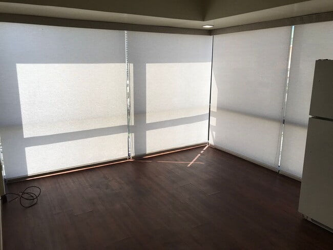 Building Photo - Century Center 1 Bdrm., 1 bath, 1 cov'd Pkg.