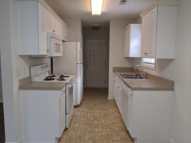 Building Photo - LARSON PLACE TOWN HOMES