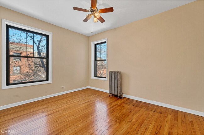 Building Photo - 6834 N Lakewood Ave