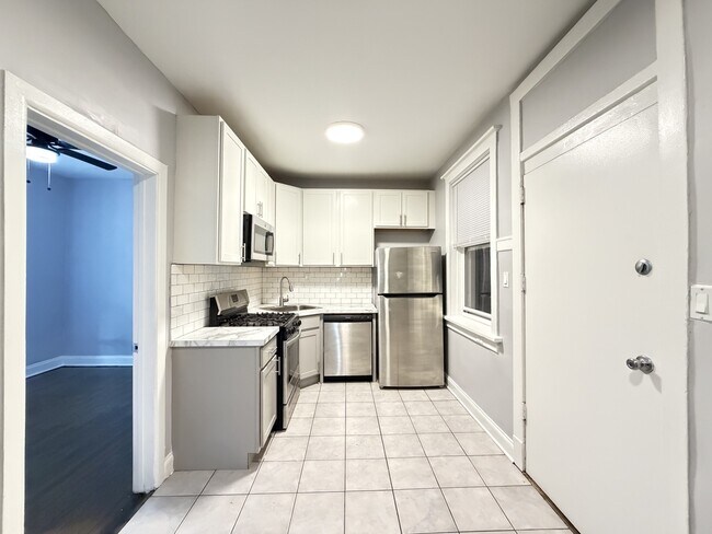 Foto del edificio - 6259 N Lakewood Ave