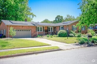 Building Photo - 6800 Woodridge Dr