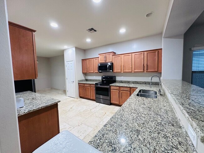 Large kitchen with granite countertops - 18215 W Townley Ave