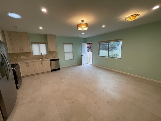 kitchen and front entry - 4131 Chevy Chase Dr