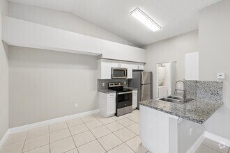 2BR, 2BA - 1180SF - Kitchen And Dining Room - The Emerson