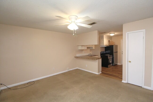 Building Photo - Quiet North Pensacola/Cantonment 2BR Brick Duplex on 1 Acre with Open Living Layout, Storage Room...